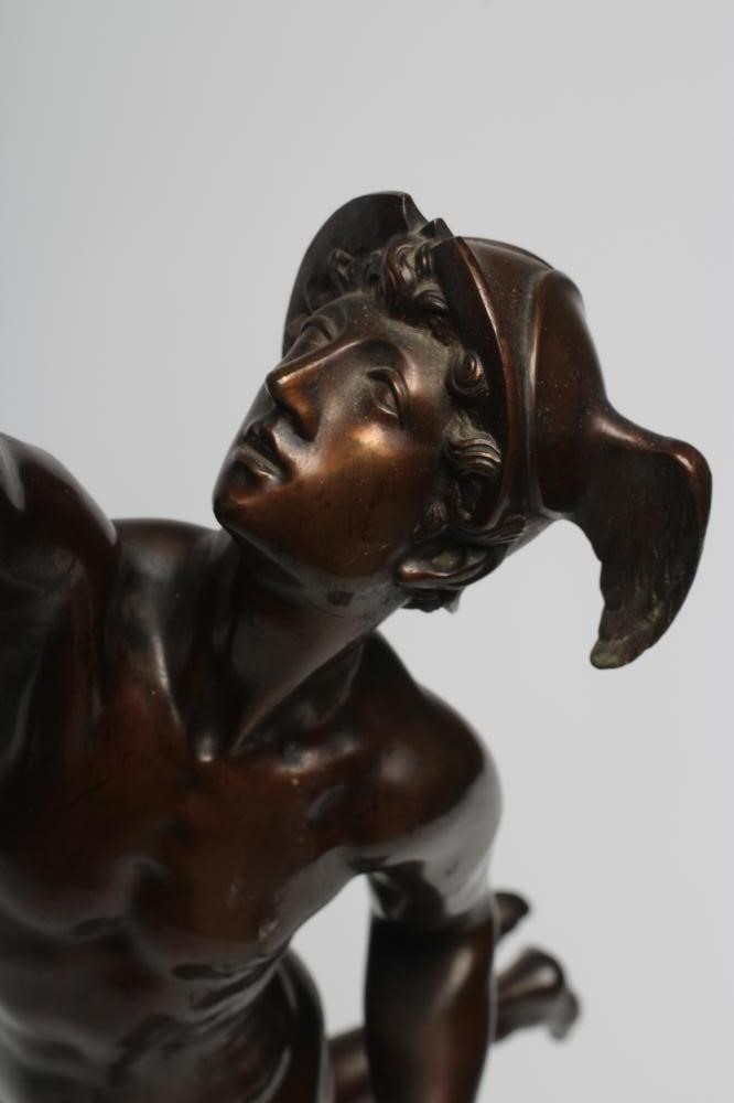 A BRONZE FIGURAL TABLE LAMP modelled as Mercury holding aloft a torch Image