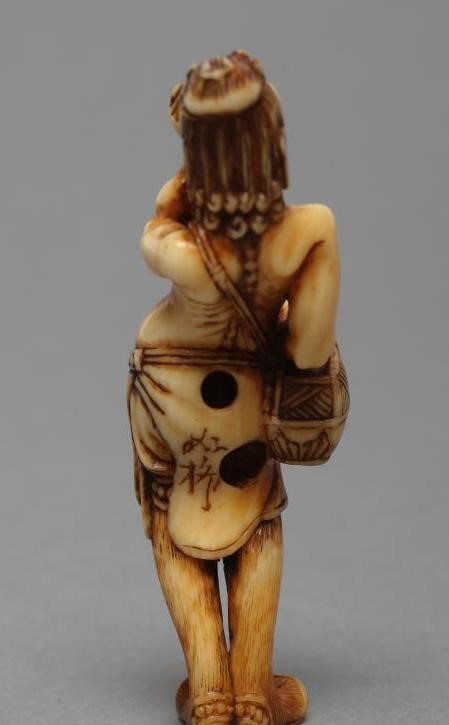 A JAPANESE IVORY NETSUKE Image