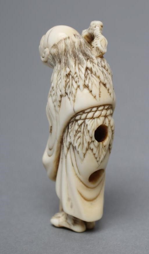 A JAPANESE IVORY NETSUKE Image