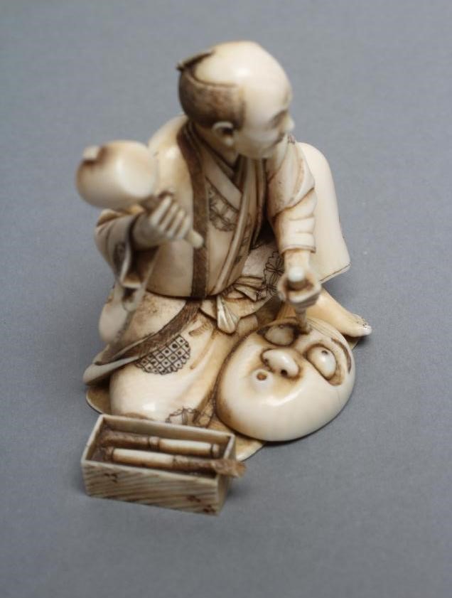 A JAPANESE IVORY OKIMONO Image