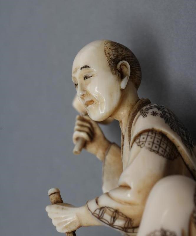 A JAPANESE IVORY OKIMONO Image