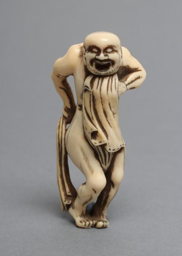 A JAPANESE IVORY NETSUKE Image