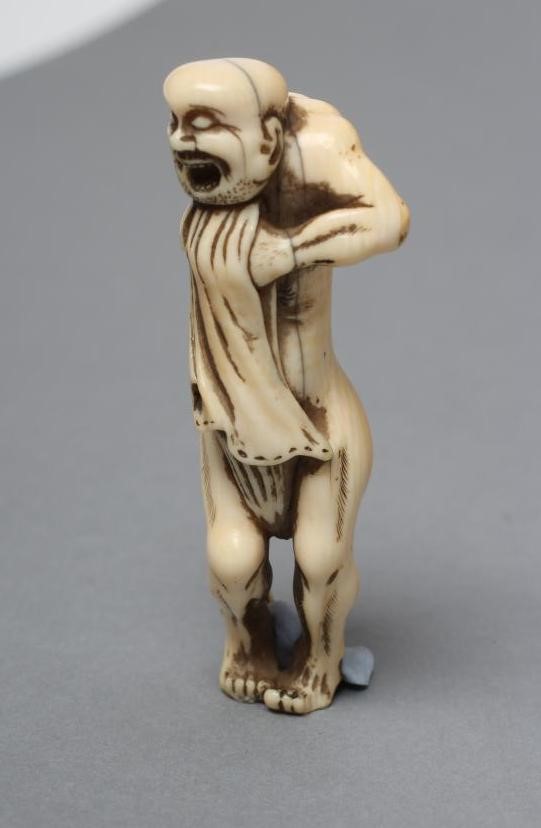 A JAPANESE IVORY NETSUKE Image