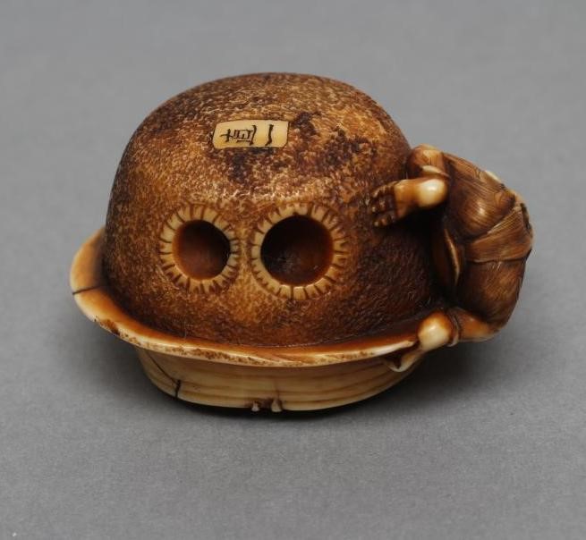 A JAPANESE IVORY NETSUKE Image
