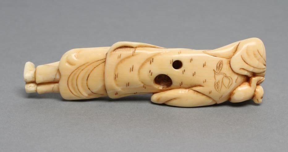 A JAPANESE IVORY NETSUKE Image