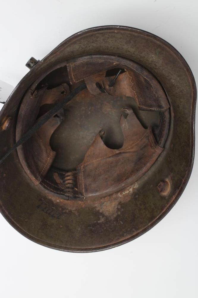 A FIRST WORLD WAR GERMAN M16 HELMET of typical form with painted exterior Image