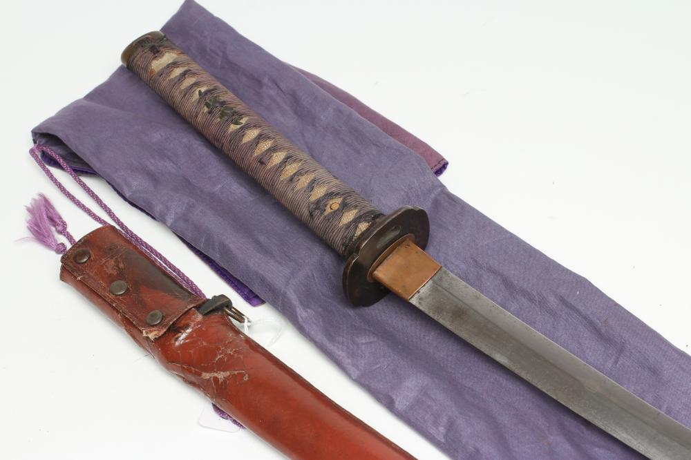 A JAPANESE OFFICER'S KATANA with 25 1/2" curved blade Image