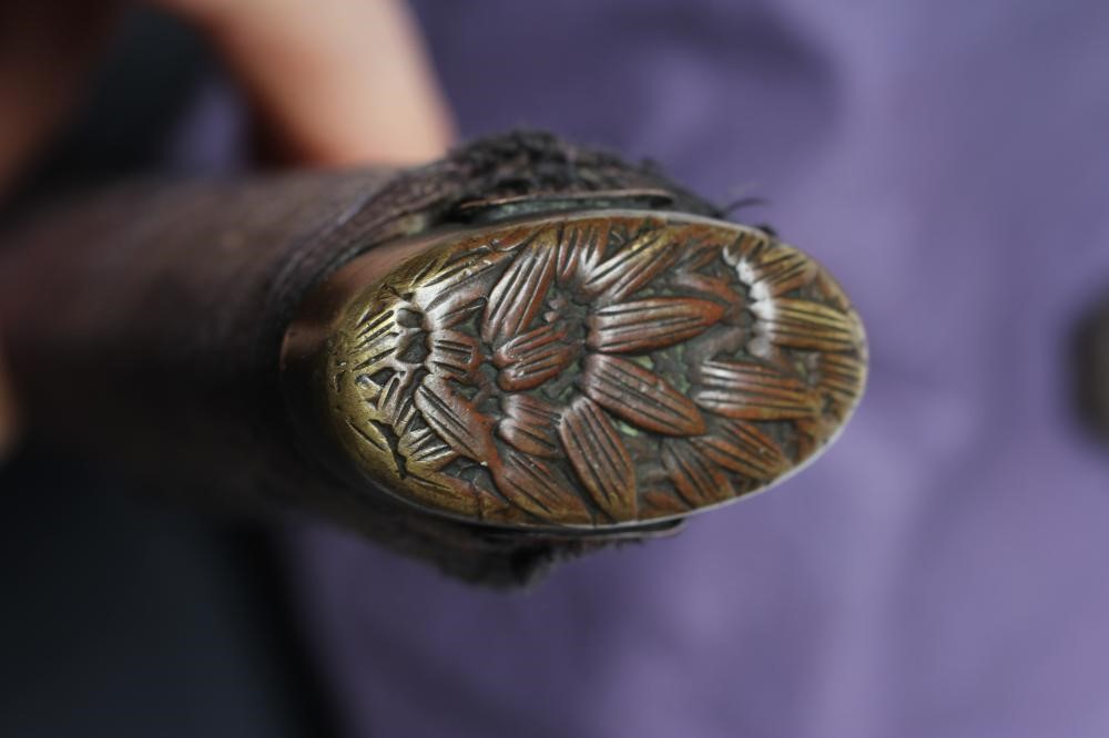 A JAPANESE OFFICER'S KATANA with 25 1/2" curved blade Image