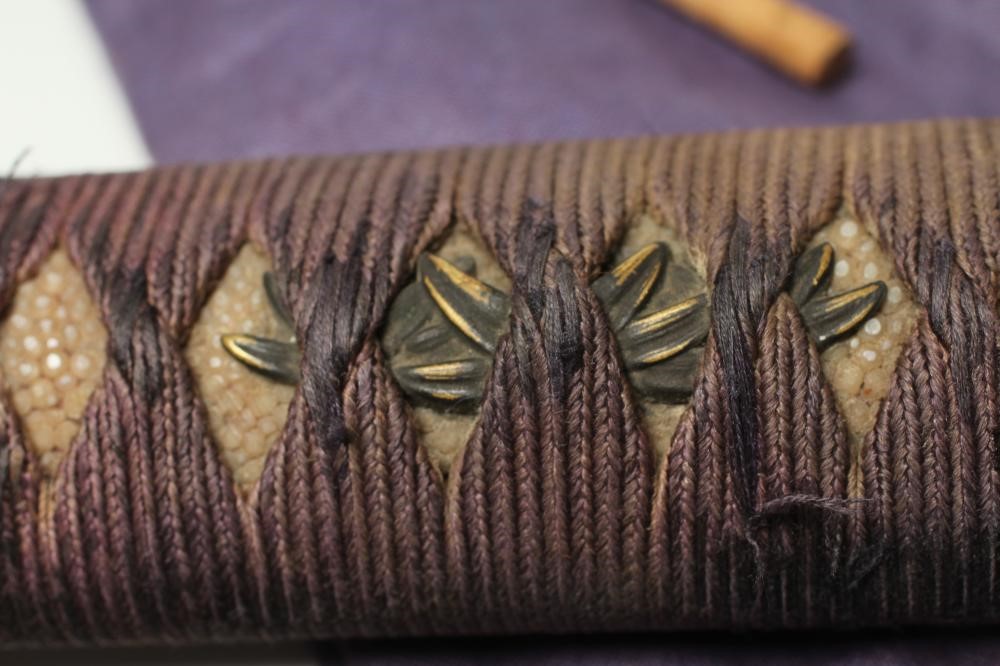 A JAPANESE OFFICER'S KATANA with 25 1/2" curved blade Image