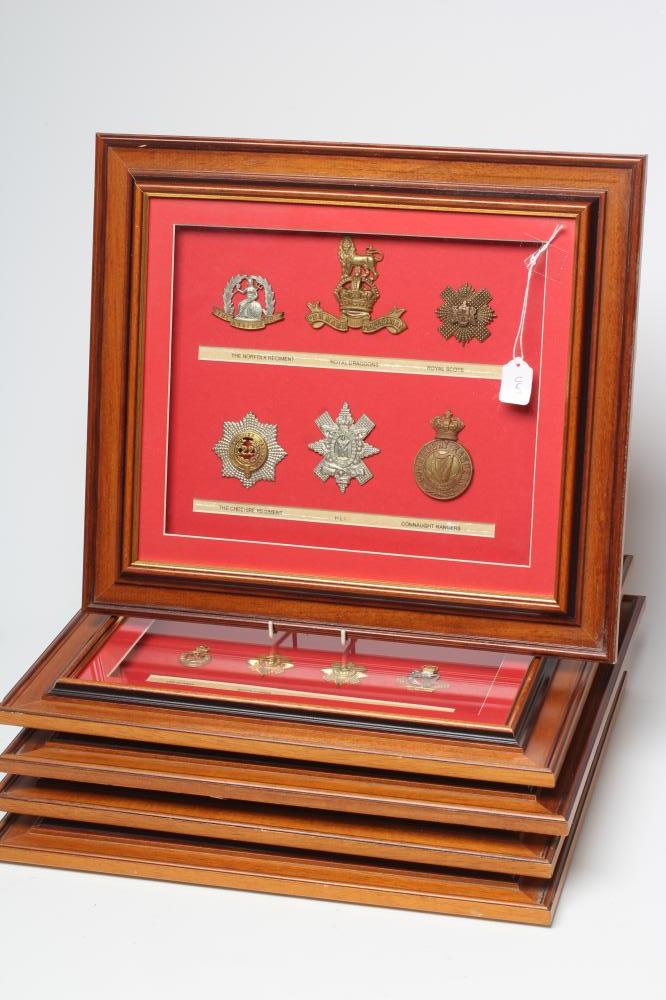 FIVE FRAMED DISPLAYS OF BRITISH MILITARY CAP BADGES Image