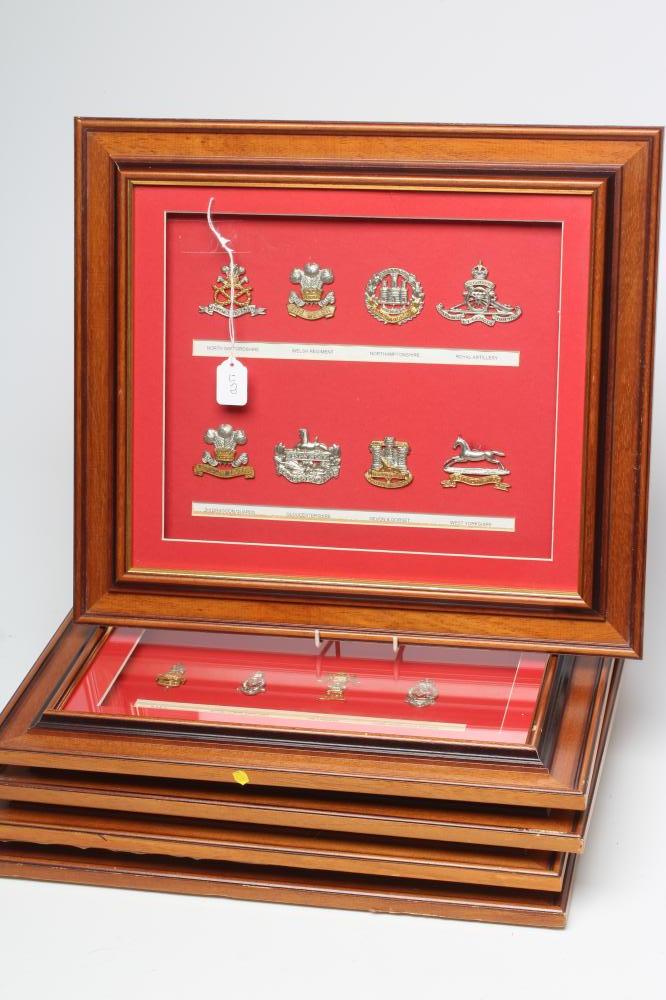 FIVE FRAMED DISPLAYS OF BRITISH MILITARY CAP BADGES Image