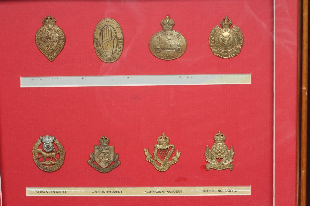 FIVE FRAMED DISPLAYS OF BRITISH MILITARY CAP BADGES Image