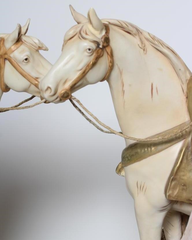 A PAIR OF ROYAL DUX EQUESTRIAN HAWKING FIGURES Image