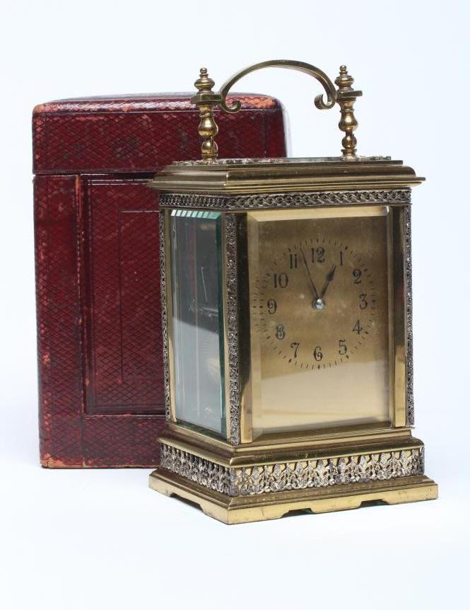 A LACQUERED BRASS CARRIAGE CLOCK Image