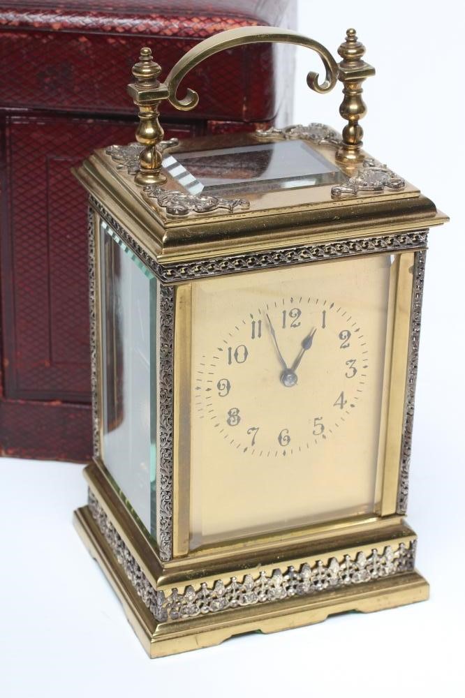 A LACQUERED BRASS CARRIAGE CLOCK Image