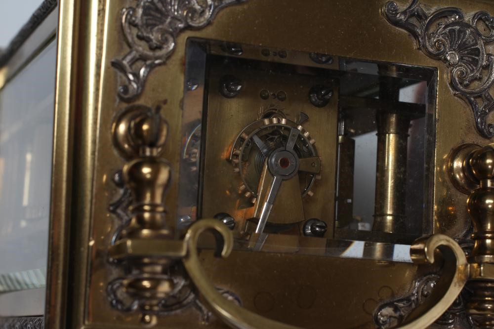 A LACQUERED BRASS CARRIAGE CLOCK Image