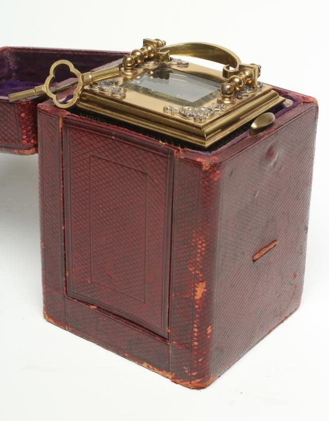 A LACQUERED BRASS CARRIAGE CLOCK Image