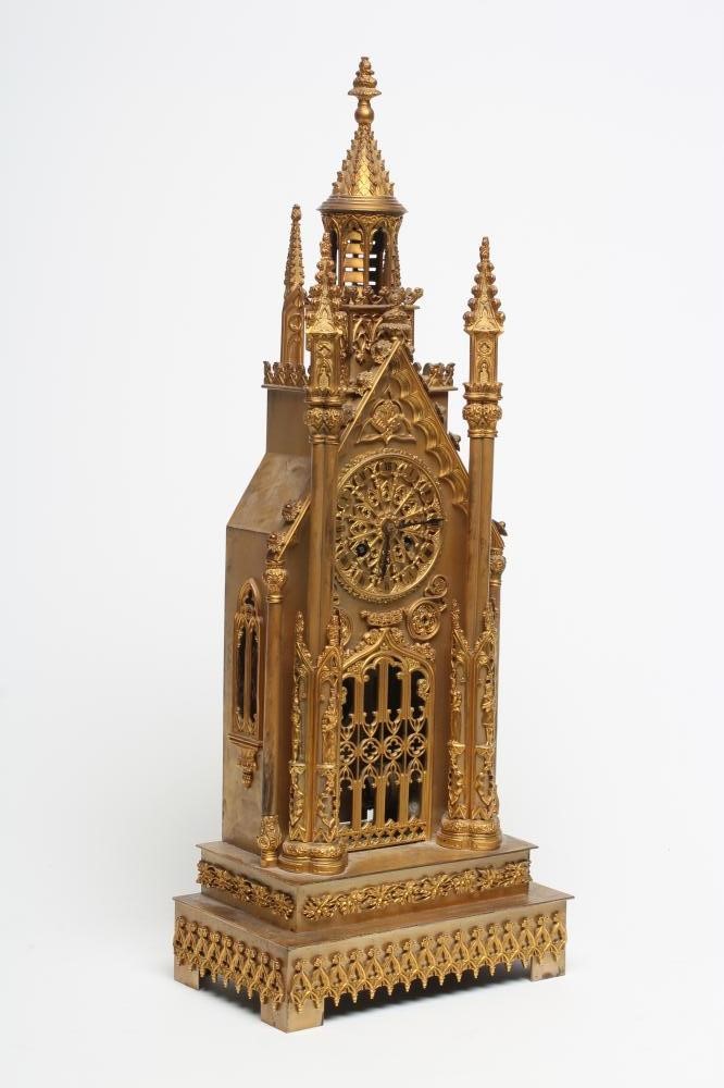 A FRENCH GILT METAL CATHEDRAL CLOCK Image