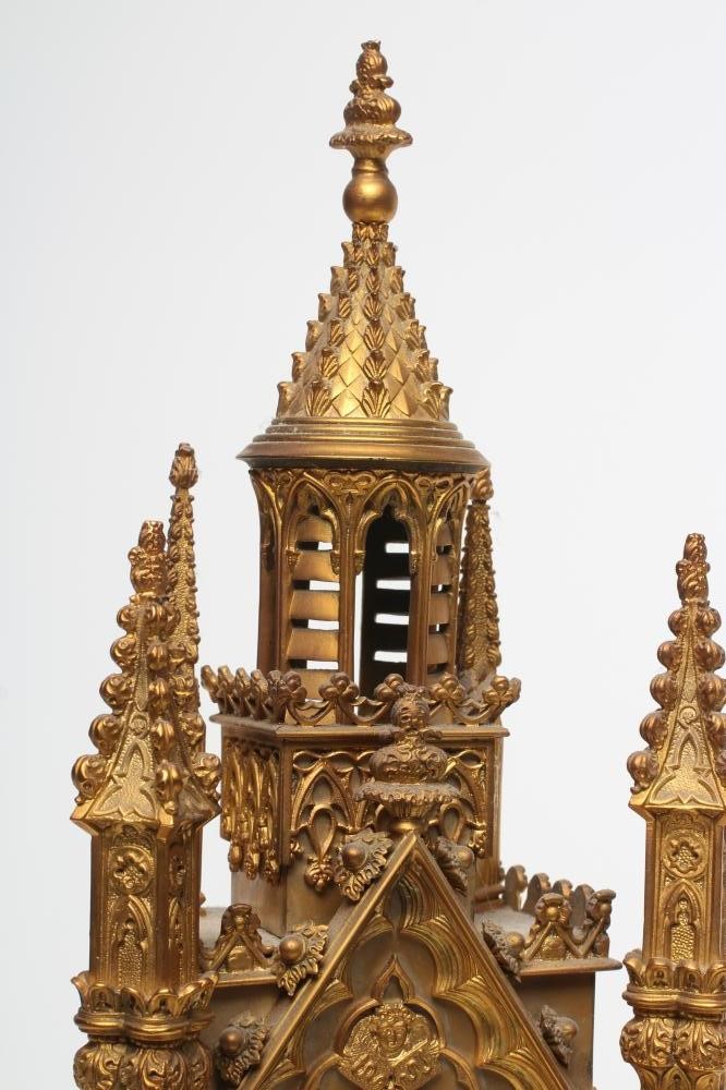 A FRENCH GILT METAL CATHEDRAL CLOCK Image
