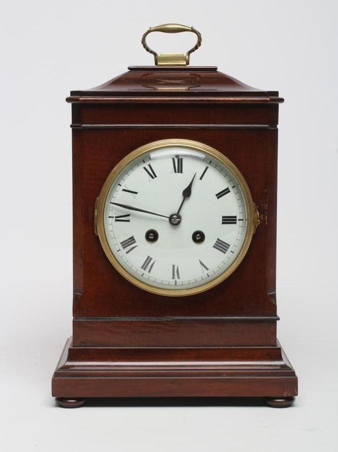A MAHOGANY CASED TABLE CLOCK Image