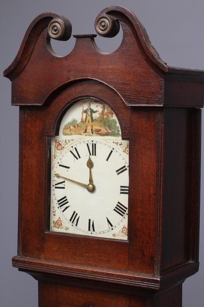 A SMALL OAK LONGCASE CLOCK Image