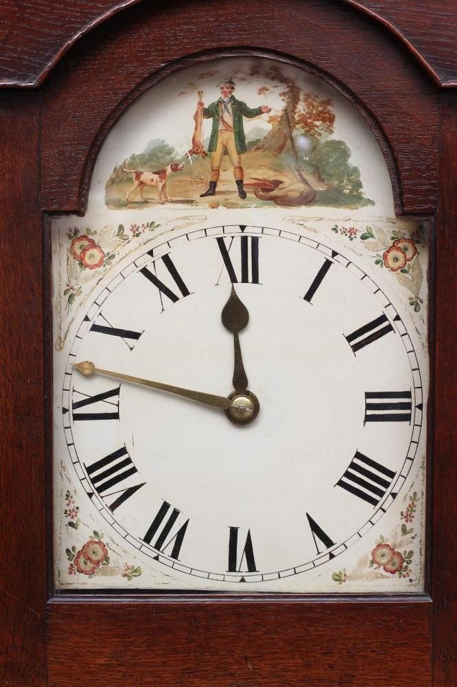 A SMALL OAK LONGCASE CLOCK Image
