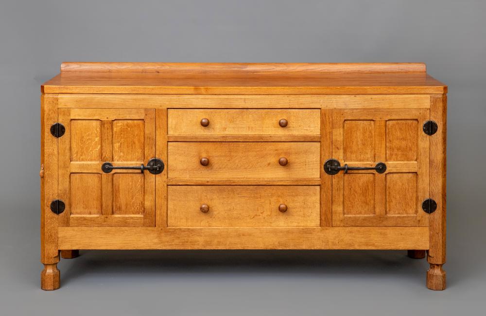 A ROBERT THOMPSON ADZED OAK SIDEBOARD Image