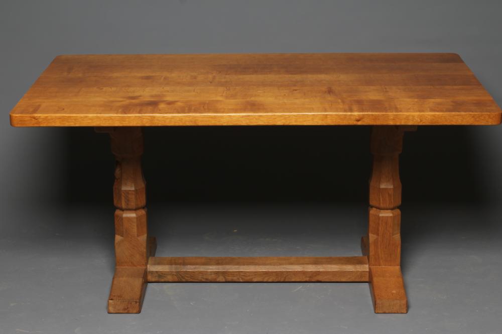 A ROBERT THOMPSON ADZED OAK DINING TABLE Image