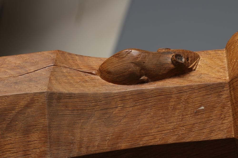 A ROBERT THOMPSON ADZED OAK DINING TABLE Image