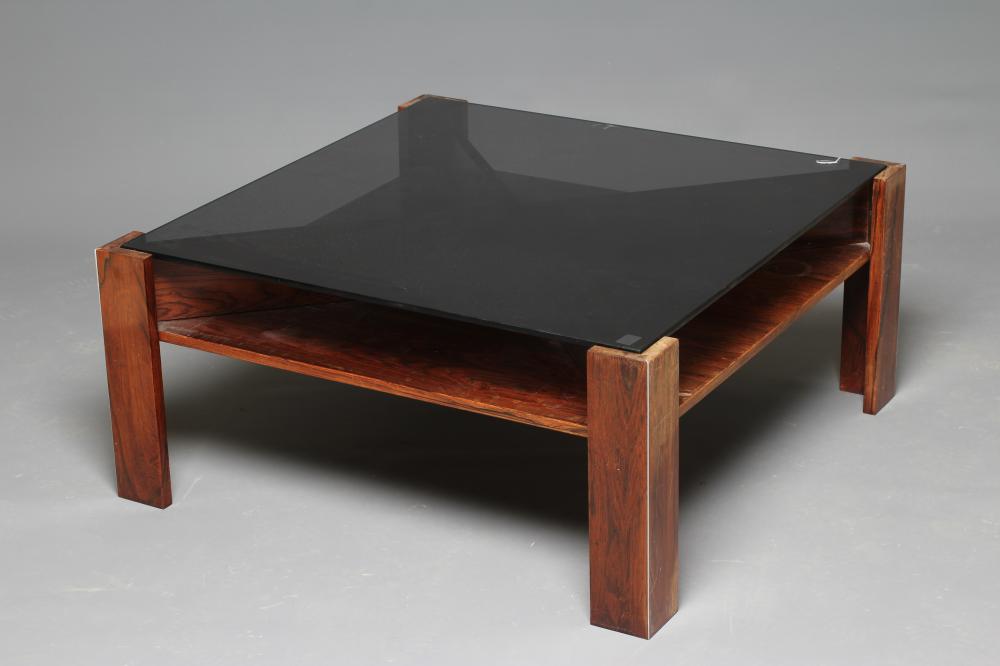 A ROSEWOOD VENEERED COFFEE TABLE Image