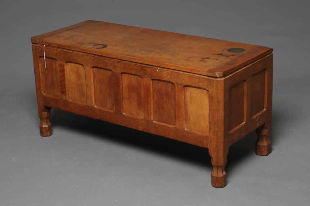A WILF HUTCHINSON ADZED OAK BLANKET BOX of canted oblong form with cleated hinged lid Image