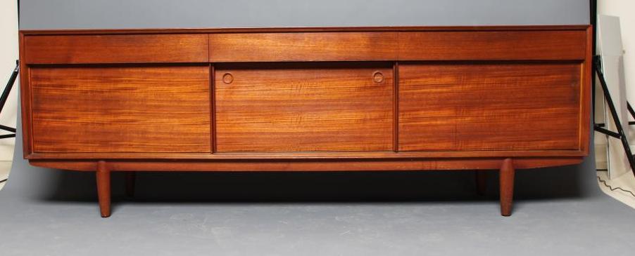 A MID CENTURY DESIGN TEAK LOW SIDEBOARD Image