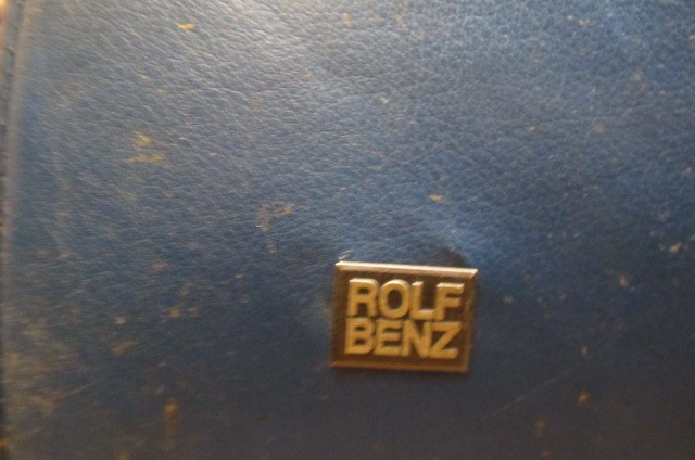 A ROLF BENZ BLUE LEATHER SWIVEL ARMCHAIR Image