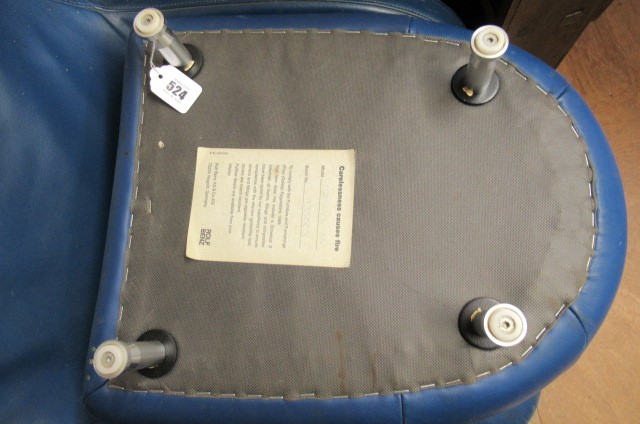A ROLF BENZ BLUE LEATHER SWIVEL ARMCHAIR Image