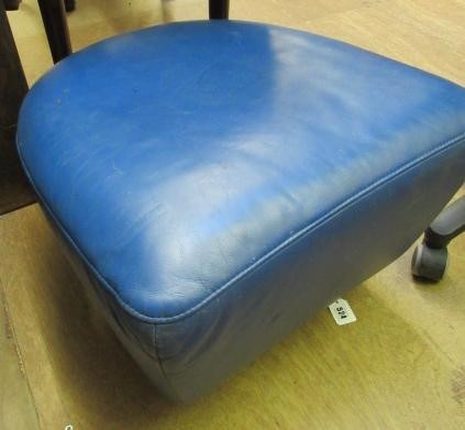A ROLF BENZ BLUE LEATHER SWIVEL ARMCHAIR Image