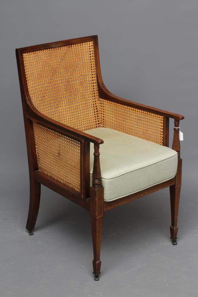 AN EDWARDIAN MAHOGANY AND CANED BERGERE with stringing Image