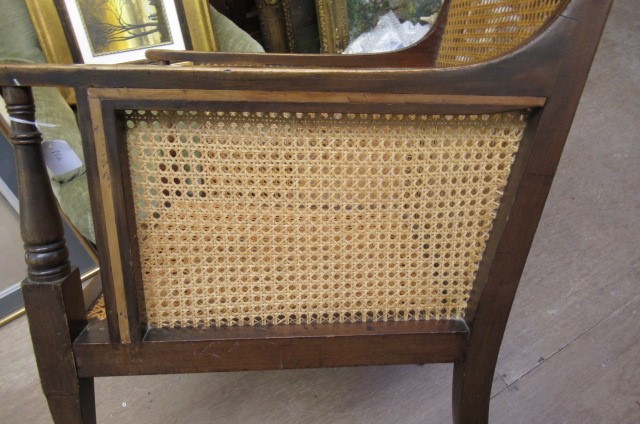 AN EDWARDIAN MAHOGANY AND CANED BERGERE with stringing Image