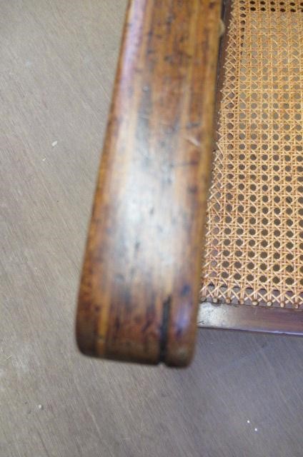 AN EDWARDIAN MAHOGANY AND CANED BERGERE with stringing Image