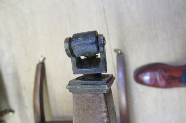 AN EDWARDIAN MAHOGANY AND CANED BERGERE with stringing Image