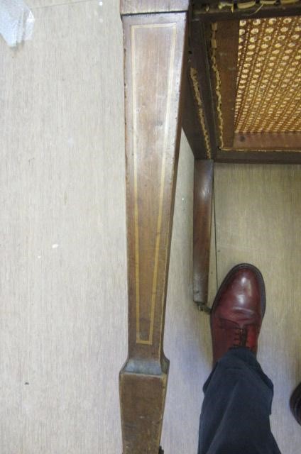 AN EDWARDIAN MAHOGANY AND CANED BERGERE with stringing Image