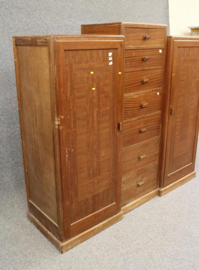A TOKEN HAND MADE MAHOGANY TRIPLE WARDROBE of inverted breakfront form Image