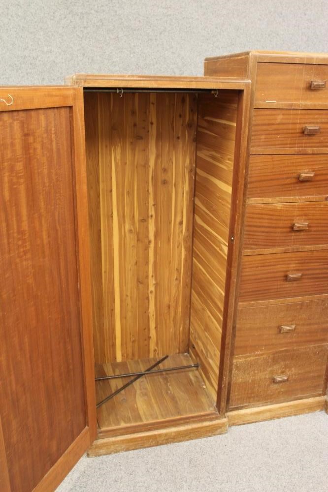 A TOKEN HAND MADE MAHOGANY TRIPLE WARDROBE of inverted breakfront form Image