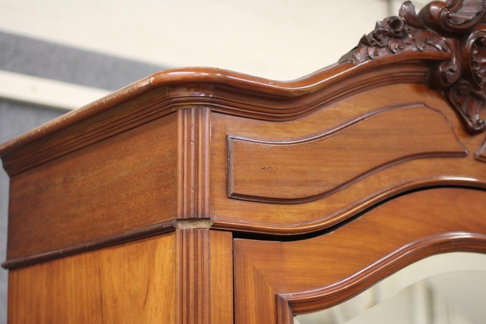 A MAHOGANY ARMOIRE Image