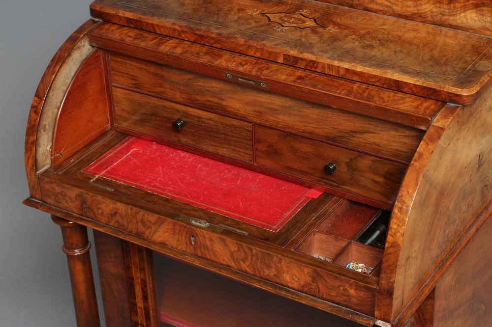 AN EARLY VICTORIAN FIGURED WALNUT DAVENPORT Image