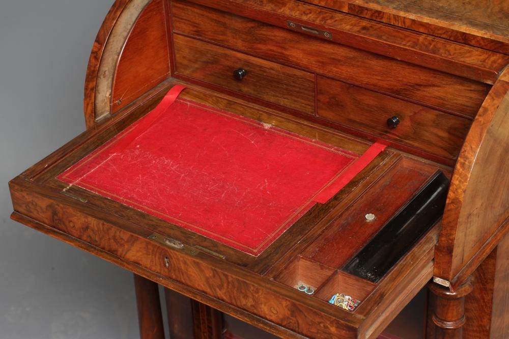 AN EARLY VICTORIAN FIGURED WALNUT DAVENPORT Image