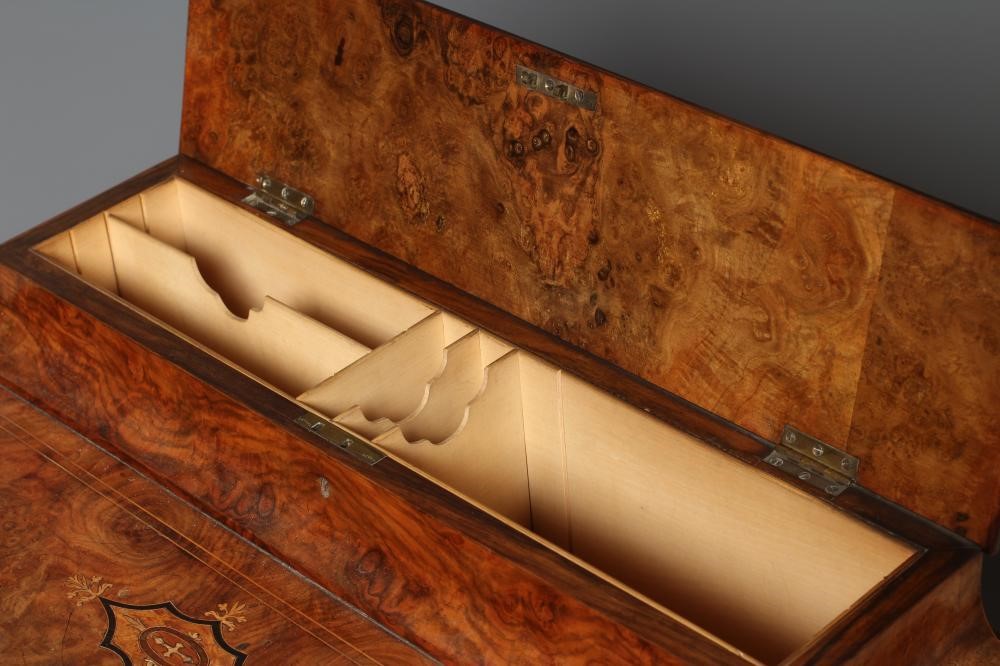 AN EARLY VICTORIAN FIGURED WALNUT DAVENPORT Image