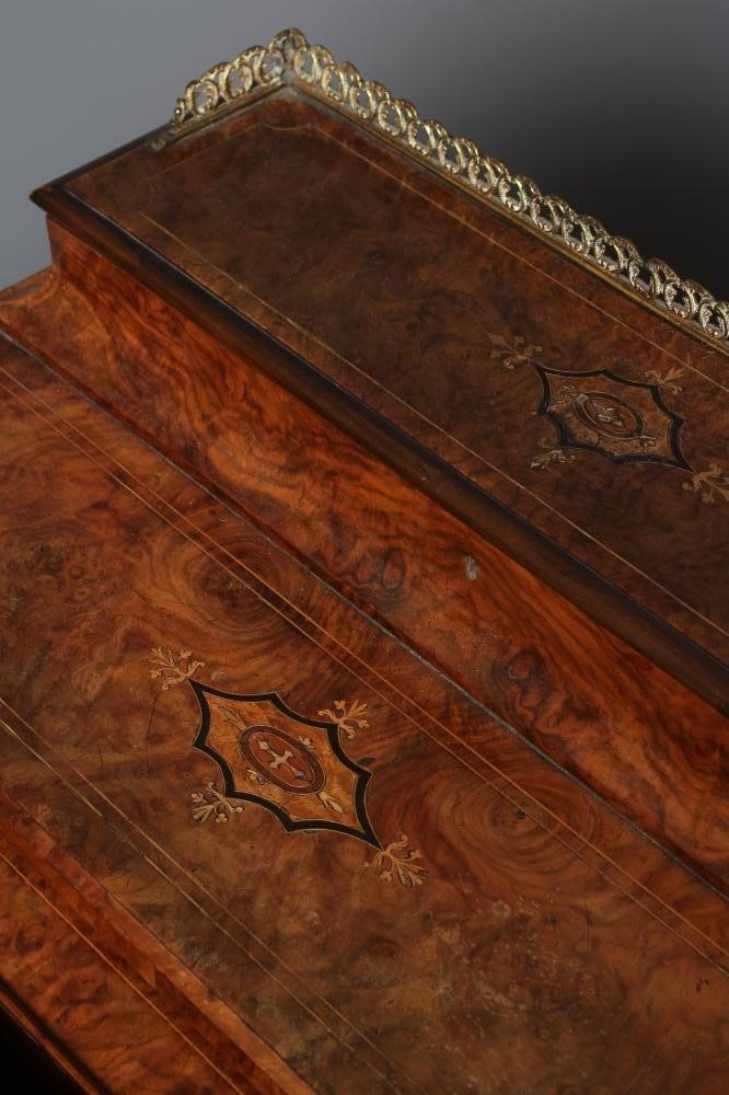 AN EARLY VICTORIAN FIGURED WALNUT DAVENPORT Image