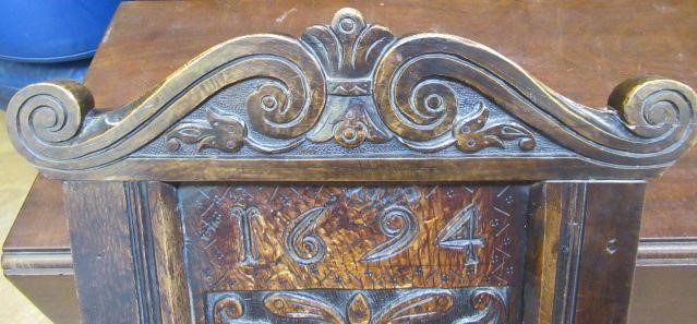 A JOINED OAK ARMCHAIR Image