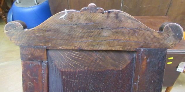 A JOINED OAK ARMCHAIR Image