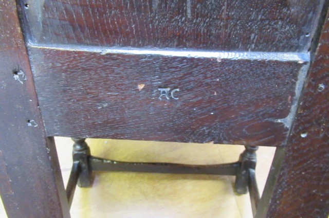 A JOINED OAK ARMCHAIR Image